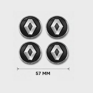 Pode incluir: Um conjunto de quatro tampas de centro de roda circulares com o logótipo de diamante Renault prateado sobre um fundo preto. Cada tampa tem um rebordo prateado metálico. Uma linha de medição indica um diâmetro de 57 mm para estes acessórios.