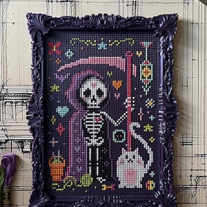 May include: A cross-stitch embroidery featuring a skeleton figure in a purple hooded cloak holding a scythe, accompanied by a white cat. The piece is encased in an ornate, dark purple rectangular frame with intricate scrollwork detailing.