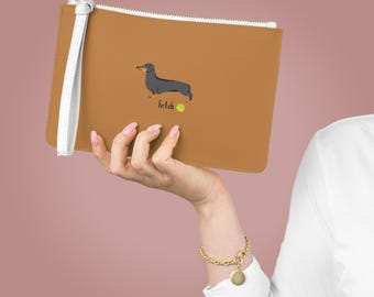 Dachshund with Tennis Ball Clutch Bag | Sausage Dog Illustration