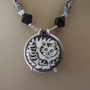 Kitty Cat Pendant Handpainted Ceramic Pendant Round Silver Plated Frame Handcrafted Necklace Black and White