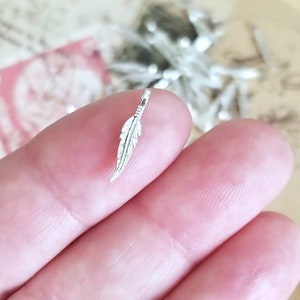 Teeny Tiny Feather Charms Little Bitty Feathers Silver Dreamcatcher Southwest Tribal Mini Boho Jewelry Supplies 16x3mm TFC4 May be Darker