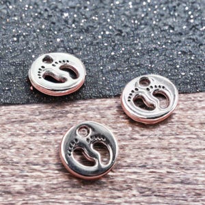 10 Tiny Baby Feet Charms Round Silver Charms with Cut Out Footprints Mother's Day Charms Footprint Charms Jewelry Supplies 10mm