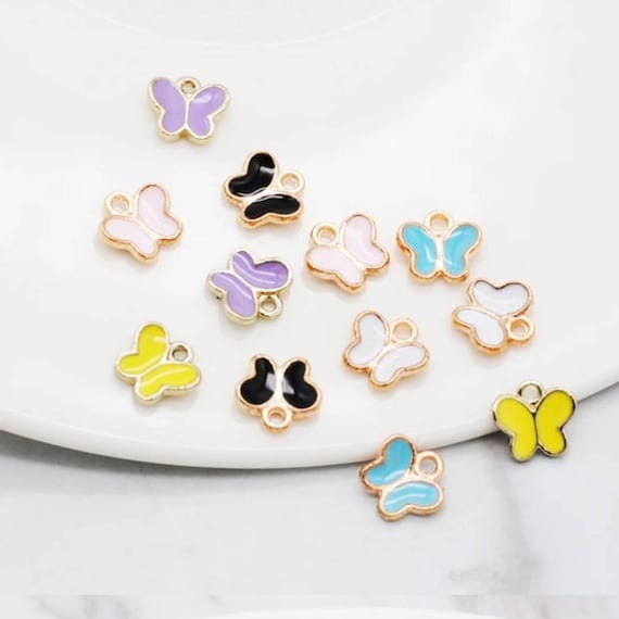 5 pcs in a Pack 24Kt Gold Plated Tiny Butterfly Red Enamelled Charms