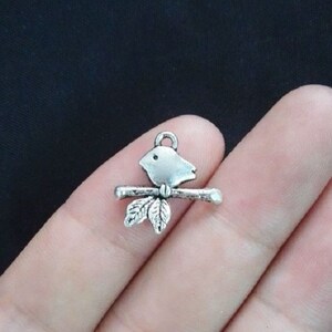 10 Sweet Little Bird on Branch Charms Bird Charms Song Bird Charms Silver or Bronze Small Bird Jewelry Supplies 16x17 mm