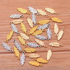 Tiny Feather Charms Mini Silver or Gold Feather Charms Nature Spiritual Tribal Boho Feathers Jewelry Supplies Findings 15x5mm