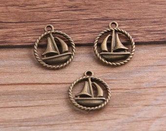 10 Small Sailboat Charms Bronze Boats in Rope Circle Charms Beach Charms Nautical Charms Jewelry Supplies 19x16mm