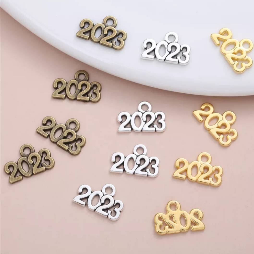 SEWACC 50pcs Year 2024 Charms, 2024 Year Letter Charms Pendant 2024 Graduation Charms DIY Jewelry Making Charm for New Years