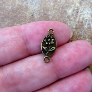 12 Tiny Flower Connectors Tiny Bronze Flower Connectors Mini Flower Charms Tiny Bronze Connectors  Jewelry Supplies 16x7mm Note Size
