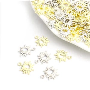10 Moon and Sun Charms Silver or Gold Radiant Suns with Moon Charms Celestial Charms Jewelry Supplies 21x17mm