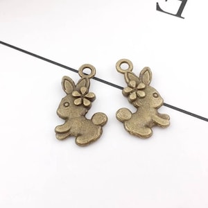 10 Little Bunny Rabbit Charms Bronze Bunny Charms with Flower Easter Bunny Charms Animal Charms Jewelry Supplies 18x12mm