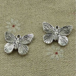 10 Butterfly Charms Slightly Curved  in Flight Vintage Boho Look Antique Silver Tone Jewelry Supplies 19x15mm