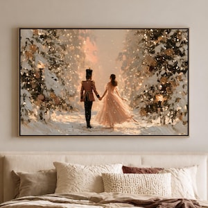 May include: A rectangular wall art print depicting a nutcracker figure in a dark uniform and a person in a flowing light-colored gown walking hand-in-hand through a snowy, illuminated forest path filled with glowing, decorated pine trees.