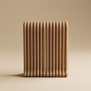 May include: A rectangular object composed of a series of vertical, parallel, light brown cylindrical rods arranged side-by-side. The structure features a uniform, matte texture and a consistent tan colour throughout, with a small vertical gap in the centre.