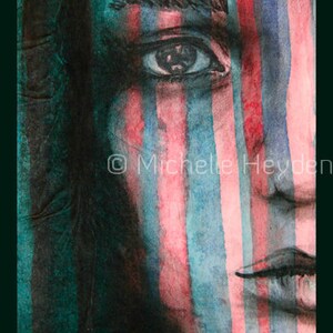 May include: A close-up of a person's face with watercolor stripes painted across the cheek. The stripes are in shades of blue, pink, and white. The person's eye is visible, and the stripes are painted over the eyebrow and eyelid. The background is a dark green color.