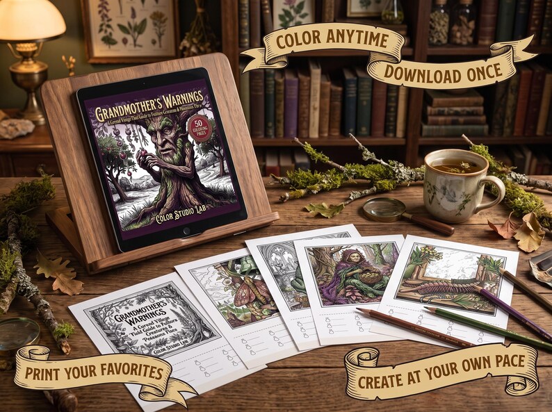May include: A digital tablet on a wooden stand displays a colouring book titled Grandmother's Warnings, accompanied by several printed colouring pages featuring fantasy illustrations, coloured pencils, and a ceramic mug on a wooden desk surface.