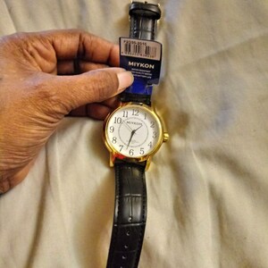Miykon Gold And White Faced Large Number Dial  Watch With IP Plate Case   30 Meters Water Resistant 10 1/4 Inches Long