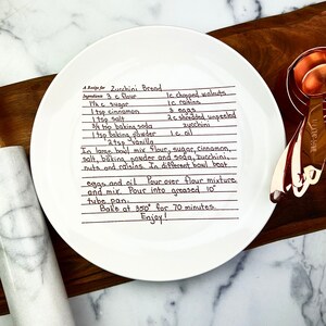 Restore your loved ones handwriting and photo to create a personalized memorial gift.