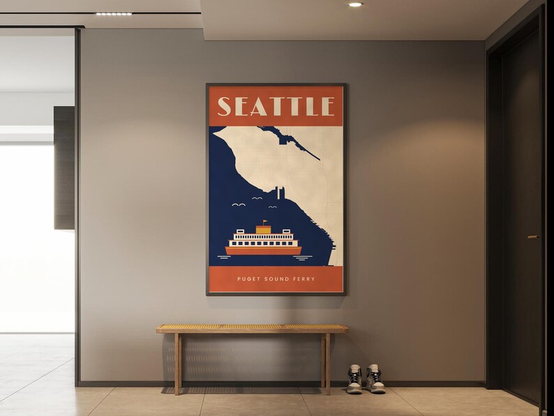 May include: A rectangular wall poster featuring a stylized graphic of a ferry on dark blue water against a cream background. The top orange banner displays the text SEATTLE in white, and the bottom orange banner reads PUGET SOUND FERRY.