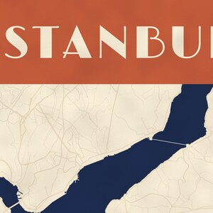 May include: A graphic map print of Istanbul featuring a deep orange horizontal header with the word ISTANBUL in white capital letters. Below the header, a cream-colored map displays the dark blue Bosphorus strait and surrounding city streets.