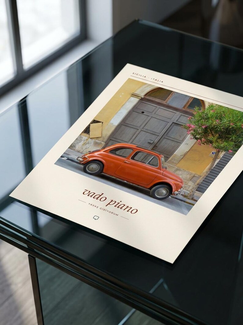 May include: A rectangular print featuring an orange vintage car parked in front of a yellow building with a large wooden door. The text SICILIA - ITALIA appears at the top, while vado piano and YAVAS GIDIYORUM are printed below the car image.