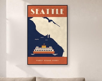 May include: A framed vertical wall art print featuring a stylized map of Seattle with a dark blue water section and a cream land section. An orange ferry boat is centered at the bottom with the text SEATTLE at the top and PUGET SOUND FERRY below.