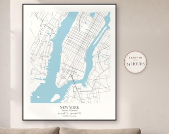 May include: A framed map print of New York City featuring black street lines on a white background with light blue water. The text reads NEW YORK, Emma & James, 40.7128 N - 74.0060 W, October 12, 2024. A circular badge states READY IN 24 HOURS.