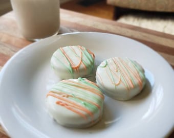 Chocolate covered sandwich cookies with chocolate drizzle