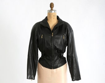 Vintage 80s Wilsons black leather jacket | 80s Wilson cropped cinched waist leather jacket