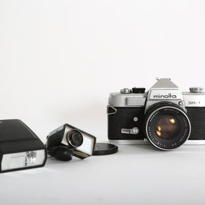 Vintage Minolta SR 1 camera with 55mm lens light meter & flash image 1