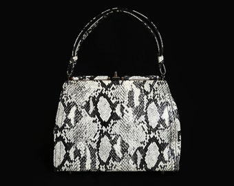 white snake print bag