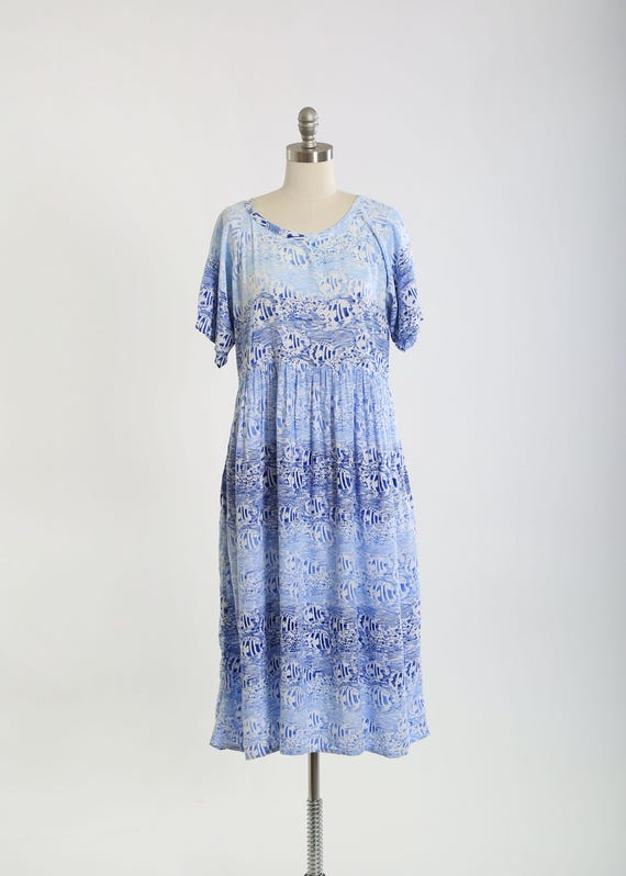 smocked velvet midi dress Victoria Velvet Smocked Tiered Midi Dress – Royal + Reese