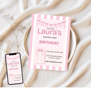 May include: A pink and white striped birthday invitation card and a smartphone displaying the same design. The card features a string of pink bows, the text Laura's Bowtiful First Birthday, a large number one, and event details for Saturday June 18th 2027.
