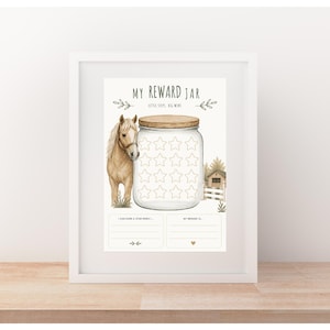 May include: A framed reward chart print titled MY REWARD JAR with the subtitle LITTLE STEPS, BIG WINS. The design features a tan horse, a glass jar with star outlines, a small barn, and two sections for writing goals and rewards.
