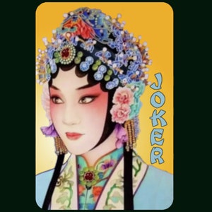 May include: A playing card with a colorful illustration of a woman wearing a traditional Chinese headdress and costume. The card is labeled "JOKER" in blue letters.