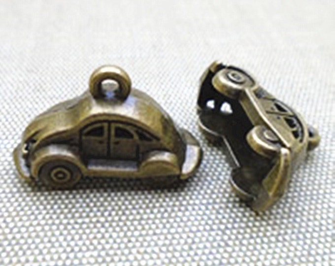 4pc 23x15mm antique bronze finish metal car pendents-10325