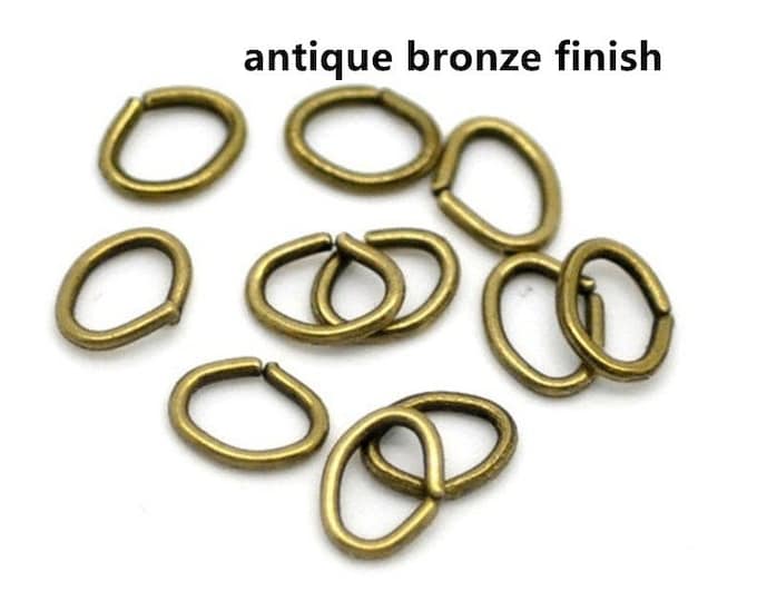 100pc 8x5mm antique bronze finish  oval jump rings-7358