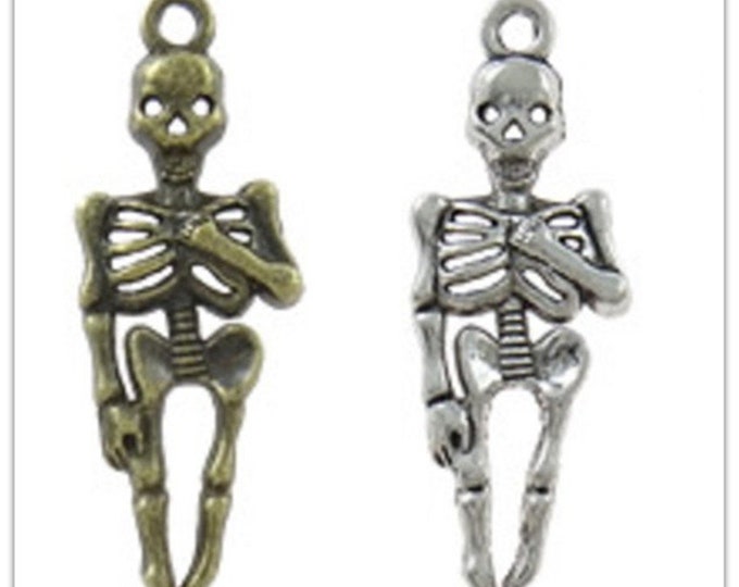 6pc 42x16mm antique finish skull pendants-pls pick your color