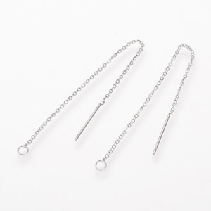 May include: A pair of silver chain earrings with a small loop at the top and a straight wire at the bottom.