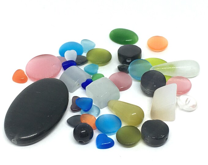 1 oz (28 grams) mix cat eye glass findings-bak107