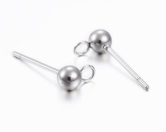 May include: Two silver earring posts with a small loop at the top and a round ball at the bottom.