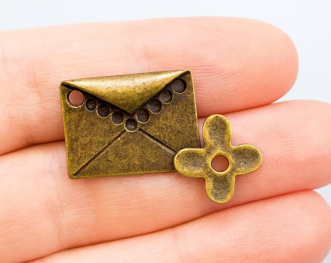 4pc antique bronze finish metal letter charms-4344