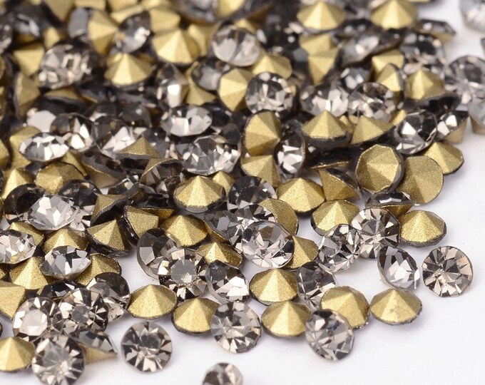 Wholesale 288pc Machine Cut Pointed back Foil Rhinestone 6-6.2mm Black Diamond SS28-7623K