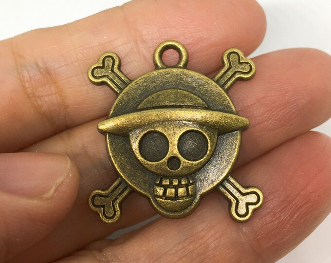 4pc 27x15mm antique bronze finish metal skull pendants-7226n