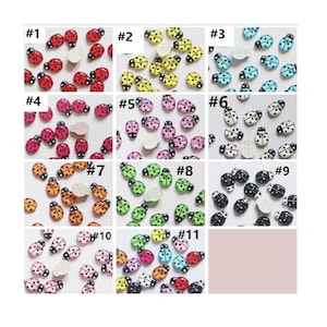 Op de afbeelding: Elf verschillende sets met lieveheersbeestje-versieringen, elke set met een andere kleur en een ander patroon. De sets zijn genummerd van 1 tot en met 11.