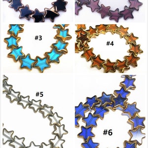 May include: Six strands of star-shaped glass beads with gold trim. Each strand is a different color: black, purple, turquoise, orange, white, and blue.