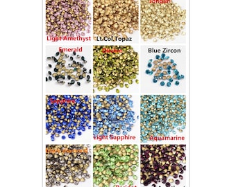 May include: Assortment of 12 colors of small, round, faceted rhinestones. The colors are: Jonquil, Light Amethyst, Lt. Col. Topaz, Emerald, Olive, Blue Zircon, Sapphire, Light Sapphire, Aquamarine, Black Diamond, Peridot, and Amethyst.