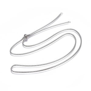 May include: A silver chain necklace with a sliding clasp. The chain is made of small, linked circles.