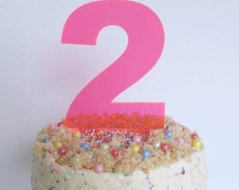 Neon pink perspex number cake topper decoration