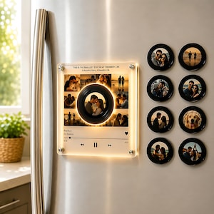May include: A square acrylic plaque with a central circular cutout and LED lighting, featuring a photo collage and music player interface with the text "THIS IS THE SMALLEST STEP IN MY ORDINARY LIFE" and "Perfect Ed Sheeran". Eight circular photo magnets.