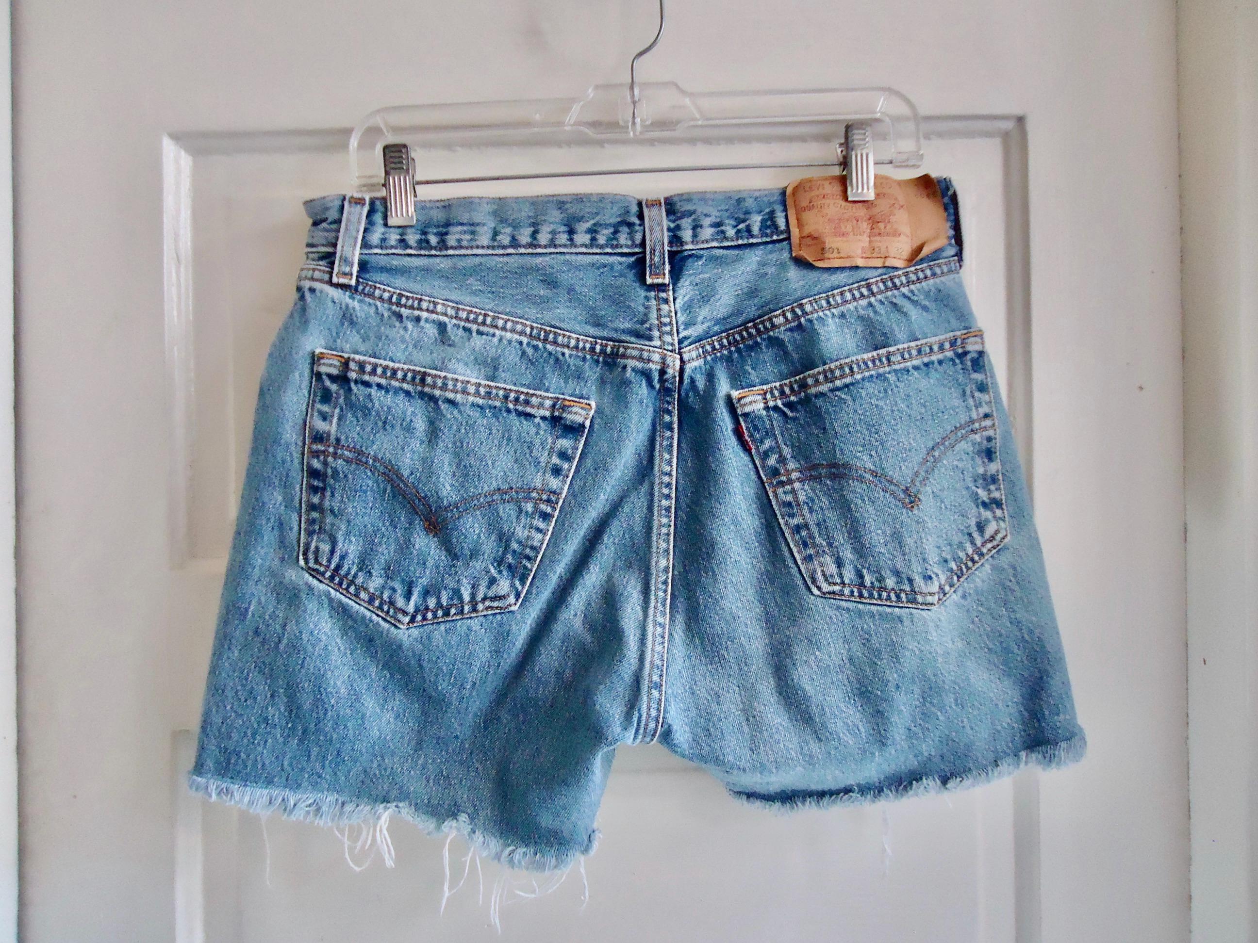 Vintage 90s LEVI 501 Cut off Distressed Denim Jean Shorts Made in 
